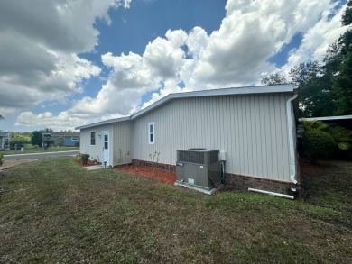 Lot Rent $1037.00 monthly    This beautifully updated home is on Del Tura Golf and Country Club in Florida - for sale on GolfHomes.com, golf home, golf lot