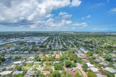 Charming 3-bed, 2-bath home in East Pompano Beach, just minutes on Pompano Beach Golf Course  in Florida - for sale on GolfHomes.com, golf home, golf lot