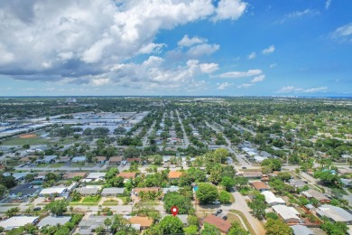 Charming 3-bed, 2-bath home in East Pompano Beach, just minutes on Pompano Beach Golf Course  in Florida - for sale on GolfHomes.com, golf home, golf lot