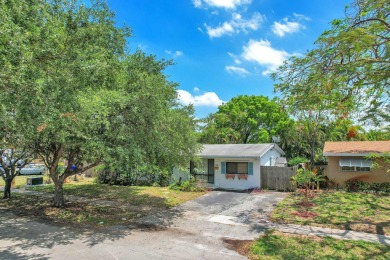 Charming 3-bed, 2-bath home in East Pompano Beach, just minutes on Pompano Beach Golf Course  in Florida - for sale on GolfHomes.com, golf home, golf lot