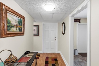 Welcome home! Very bright and updated unit with amazing natural on Palm-Aire Country Club and Resort - Palms in Florida - for sale on GolfHomes.com, golf home, golf lot