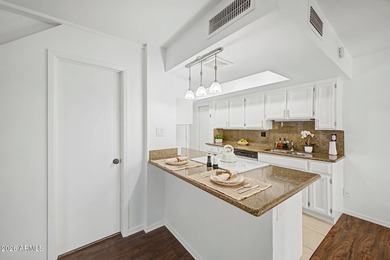 Discover this charming two-story townhome in the highly on Arizona Grand Resort Golf Course in Arizona - for sale on GolfHomes.com, golf home, golf lot