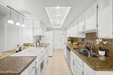 Discover this charming two-story townhome in the highly on Arizona Grand Resort Golf Course in Arizona - for sale on GolfHomes.com, golf home, golf lot