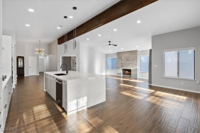Discover comfortable elegance in the highly sought-after Painted on Painted Desert Golf Club in Nevada - for sale on GolfHomes.com, golf home, golf lot