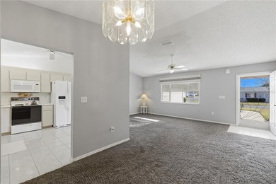 Welcome home to this Holly model 3-bedroom, 2-bath residence in on The Links of Spruce Creek in Florida - for sale on GolfHomes.com, golf home, golf lot