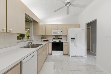 Welcome home to this Holly model 3-bedroom, 2-bath residence in on The Links of Spruce Creek in Florida - for sale on GolfHomes.com, golf home, golf lot