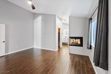 Discover comfortable elegance in the highly sought-after Painted on Painted Desert Golf Club in Nevada - for sale on GolfHomes.com, golf home, golf lot