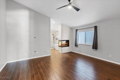 Discover comfortable elegance in the highly sought-after Painted on Painted Desert Golf Club in Nevada - for sale on GolfHomes.com, golf home, golf lot