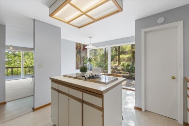 Discover this exceptional mid-century gem, designed by renowned on Spokane Country Club in Washington - for sale on GolfHomes.com, golf home, golf lot