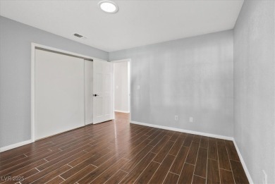 Discover comfortable elegance in the highly sought-after Painted on Painted Desert Golf Club in Nevada - for sale on GolfHomes.com, golf home, golf lot