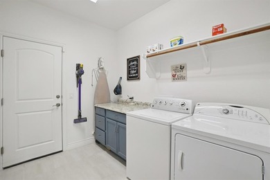 A BEAUTIFUL move-in-ready home in the heart of Robson Ranch on Wildhorse Golf Club of Robson Ranch in Texas - for sale on GolfHomes.com, golf home, golf lot