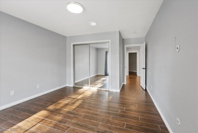 Discover comfortable elegance in the highly sought-after Painted on Painted Desert Golf Club in Nevada - for sale on GolfHomes.com, golf home, golf lot