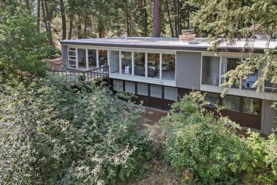 Discover this exceptional mid-century gem, designed by renowned on Spokane Country Club in Washington - for sale on GolfHomes.com, golf home, golf lot