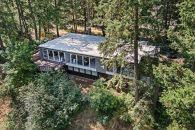 Discover this exceptional mid-century gem, designed by renowned on Spokane Country Club in Washington - for sale on GolfHomes.com, golf home, golf lot
