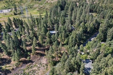 Discover this exceptional mid-century gem, designed by renowned on Spokane Country Club in Washington - for sale on GolfHomes.com, golf home, golf lot