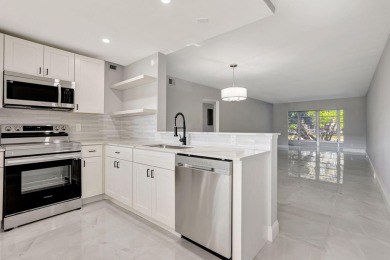 FULLY RENOVATED 2-Bedroom Condo in the Heart of Wynmoor! This on Wynmoor Golf Course in Florida - for sale on GolfHomes.com, golf home, golf lot