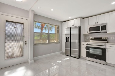 FULLY RENOVATED 2-Bedroom Condo in the Heart of Wynmoor! This on Wynmoor Golf Course in Florida - for sale on GolfHomes.com, golf home, golf lot