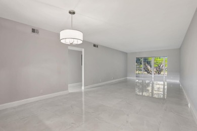 FULLY RENOVATED 2-Bedroom Condo in the Heart of Wynmoor! This on Wynmoor Golf Course in Florida - for sale on GolfHomes.com, golf home, golf lot