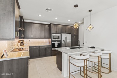 Fabulous first-floor resort style living abounds as this Villa on Sterling Grove Golf & Country Club in Arizona - for sale on GolfHomes.com, golf home, golf lot