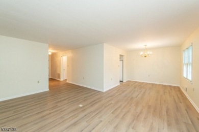 Freshly painted 3-bedroom, den & 3-bath end-unit townhouse on Panther Valley Golf and Country Club in New Jersey - for sale on GolfHomes.com, golf home, golf lot