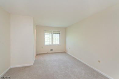 Freshly painted 3-bedroom, den & 3-bath end-unit townhouse on Panther Valley Golf and Country Club in New Jersey - for sale on GolfHomes.com, golf home, golf lot