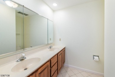 Freshly painted 3-bedroom, den & 3-bath end-unit townhouse on Panther Valley Golf and Country Club in New Jersey - for sale on GolfHomes.com, golf home, golf lot
