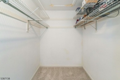 Freshly painted 3-bedroom, den & 3-bath end-unit townhouse on Panther Valley Golf and Country Club in New Jersey - for sale on GolfHomes.com, golf home, golf lot