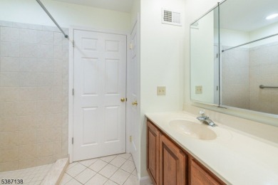Freshly painted 3-bedroom, den & 3-bath end-unit townhouse on Panther Valley Golf and Country Club in New Jersey - for sale on GolfHomes.com, golf home, golf lot