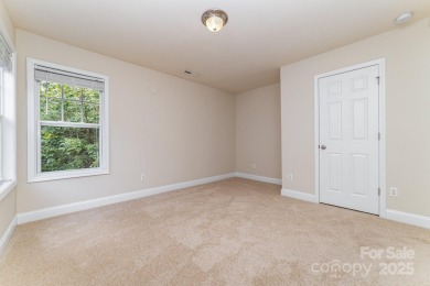 Welcome to 9836 Coatbridge Dr NW, a beautifully maintained home on Highland Creek Golf Club in North Carolina - for sale on GolfHomes.com, golf home, golf lot