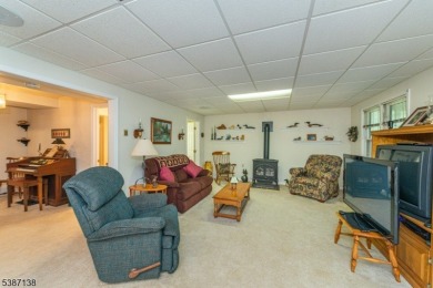 Freshly painted 3-bedroom, den & 3-bath end-unit townhouse on Panther Valley Golf and Country Club in New Jersey - for sale on GolfHomes.com, golf home, golf lot