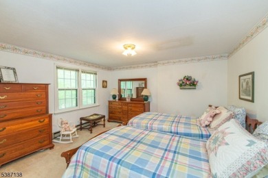 Freshly painted 3-bedroom, den & 3-bath end-unit townhouse on Panther Valley Golf and Country Club in New Jersey - for sale on GolfHomes.com, golf home, golf lot