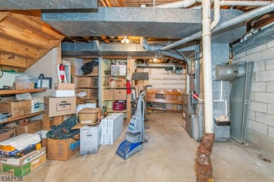 Freshly painted 3-bedroom, den & 3-bath end-unit townhouse on Panther Valley Golf and Country Club in New Jersey - for sale on GolfHomes.com, golf home, golf lot