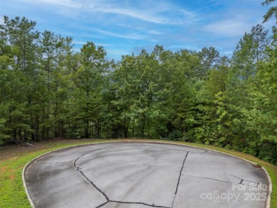 Private lot with mountain & golf course views in the highly on Brights Creek Golf Course in North Carolina - for sale on GolfHomes.com, golf home, golf lot