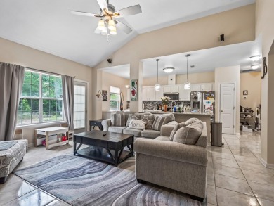 Welcome to this beautifully maintained 3-bedroom, 2-bathroom on Wildwood Country Club in Florida - for sale on GolfHomes.com, golf home, golf lot