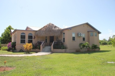 Sea Breezes  Fairway Views--Your Belizean Dream Home Awaits.

 on  in  - for sale on GolfHomes.com, golf home, golf lot