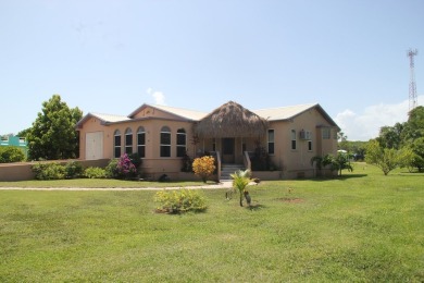 Sea Breezes  Fairway Views--Your Belizean Dream Home Awaits.

 on  in  - for sale on GolfHomes.com, golf home, golf lot