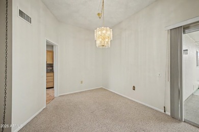 Welcome to this charming single-level attached home in Sun City on Sun City Lakes West and East in Arizona - for sale on GolfHomes.com, golf home, golf lot