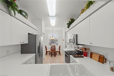 Enjoy spectacular lake and golf course views from this on Stoneybrook Golf Club in Florida - for sale on GolfHomes.com, golf home, golf lot