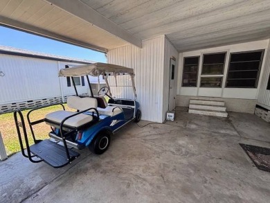 Welcome to your perfect year-round retreat! This charming 2 on Lake Henry Golf Club in Florida - for sale on GolfHomes.com, golf home, golf lot