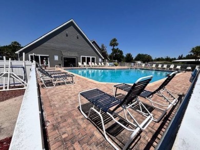 Welcome to your perfect year-round retreat! This charming 2 on Lake Henry Golf Club in Florida - for sale on GolfHomes.com, golf home, golf lot