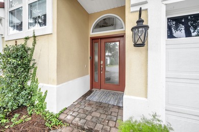 Step inside this beautifully maintained two-story home located on Regatta Bay Golf and Country Club in Florida - for sale on GolfHomes.com, golf home, golf lot