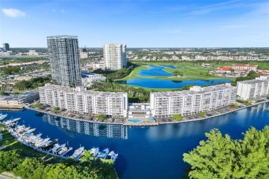 Step into this fully furnished two bedroom apartment just on The Diplomat Golf Resort and Spa in Florida - for sale on GolfHomes.com, golf home, golf lot