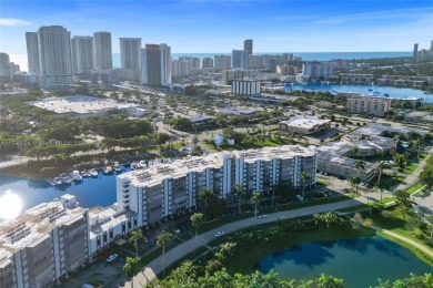 Step into this fully furnished two bedroom apartment just on The Diplomat Golf Resort and Spa in Florida - for sale on GolfHomes.com, golf home, golf lot