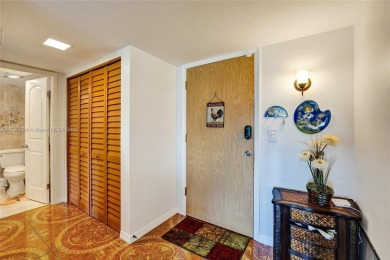 Step into this fully furnished two bedroom apartment just on The Diplomat Golf Resort and Spa in Florida - for sale on GolfHomes.com, golf home, golf lot