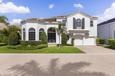 Experience unparalleled luxury in this modern masterpiece on Woodfield Country Club in Florida - for sale on GolfHomes.com, golf home, golf lot