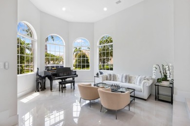 Experience unparalleled luxury in this modern masterpiece on Woodfield Country Club in Florida - for sale on GolfHomes.com, golf home, golf lot