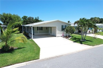 Beautifully maintained home built in 2002, offering over 1,500 on Barefoot Bay Golf Course in Florida - for sale on GolfHomes.com, golf home, golf lot