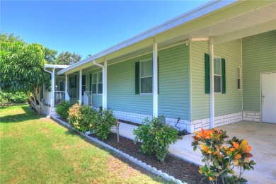 Beautifully maintained home built in 2002, offering over 1,500 on Barefoot Bay Golf Course in Florida - for sale on GolfHomes.com, golf home, golf lot