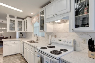 Beautifully maintained home built in 2002, offering over 1,500 on Barefoot Bay Golf Course in Florida - for sale on GolfHomes.com, golf home, golf lot