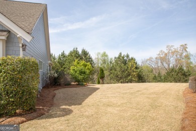 Nestled at the end of a serene cul-de-sac, this charming house on Lanier Island Legacy Golf Couorse in Georgia - for sale on GolfHomes.com, golf home, golf lot